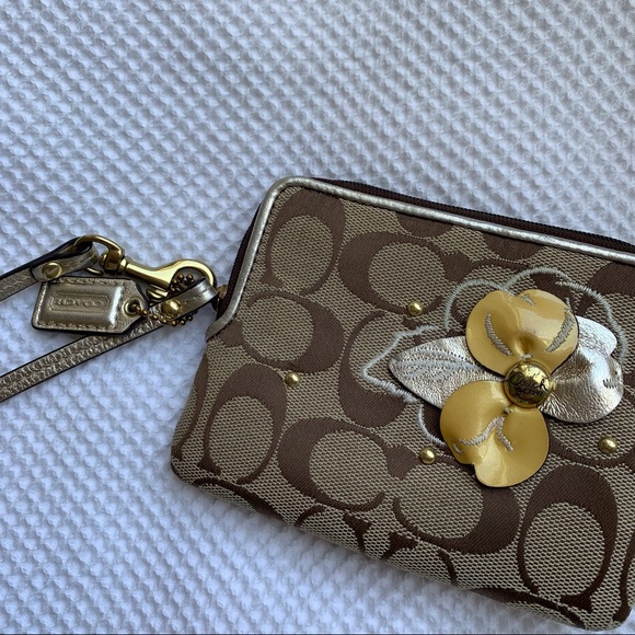 Coach Signature C Canvas Wristlet with Flower - Picture 2 of 13
